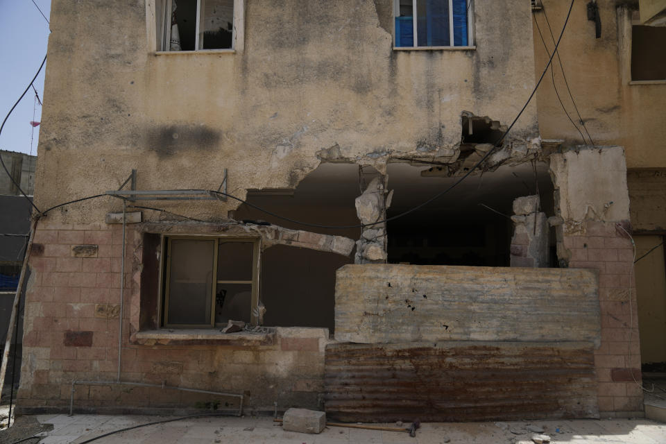 The front of a Palestinian building that were destroyed during Israeli army operations in the Nur Shams refugee camp in the West Bank on May 20, 2024. (AP Photo/Nasser Nasser)