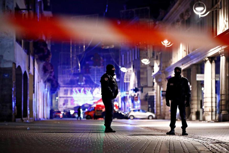 Police officers search for the suspect, who has served prison sentences in France and Germany for common law offences (Reuters)