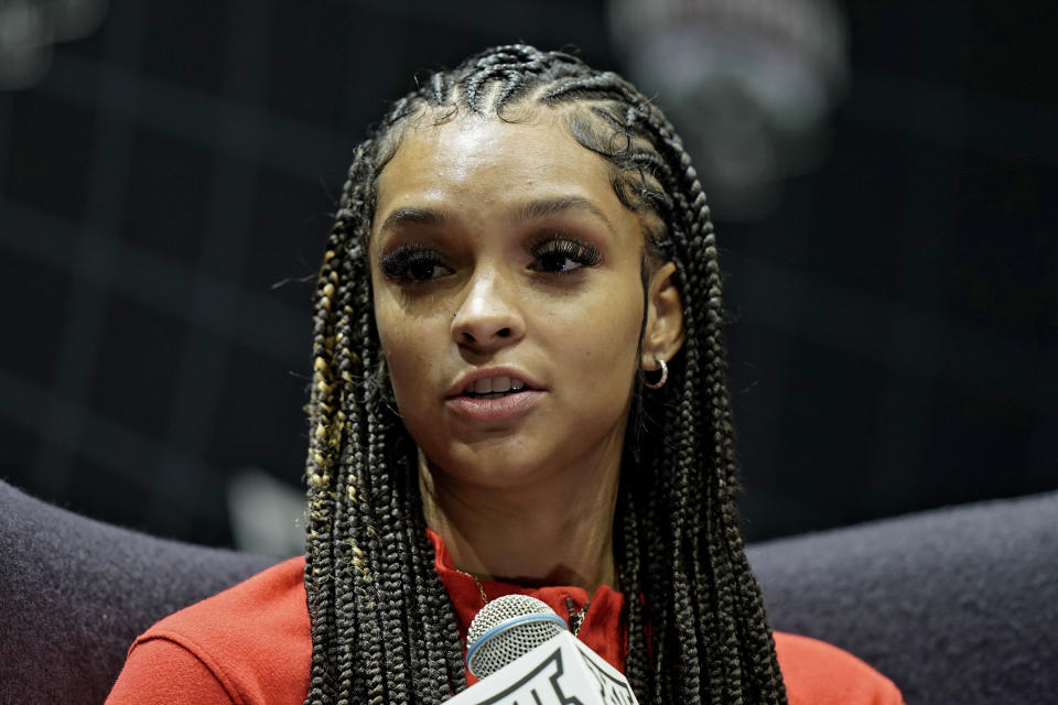 Cincinnati's Braylyn Milton addresses the media during the NCAA college Big 12 women's basketball media day Tuesday, Oct. 17, 2023, in Kansas City, Mo. (AP Photo/Charlie Riedel)