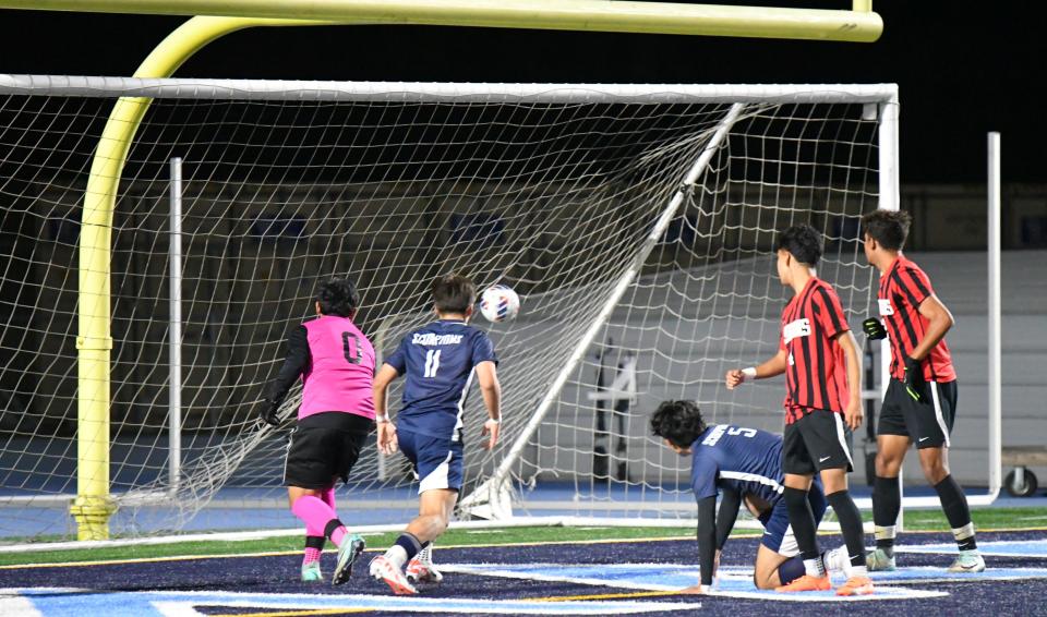 Michael Mariscal (11) scores a goal in Camarillo's 1-0 win over Rio Mesa in a boys soccer game on Wednesday, Nov. 29, 2023.