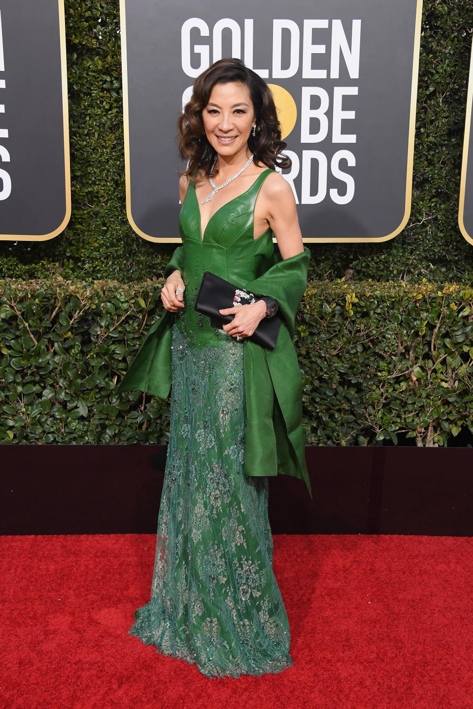 Michelle Yeoh attended the 76th Annual Golden Globe Awards in 2019 wearing an emerald green leather Shiatzy Chen gown. (Photo by Steve Granitz/WireImage)