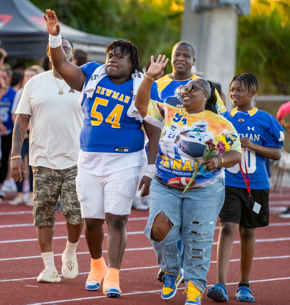 Cardinal Newman Ta'Narie Locust waves during Senior Night against Benjamin during their football game on October 20, 2023 in West Palm Beach, Florida.