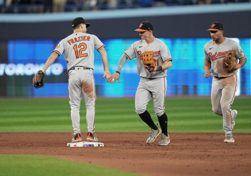 Austin Hays (center) helped ensure an Orioles victory with a late diving catch. (Nick Turchiaro/Orioles)