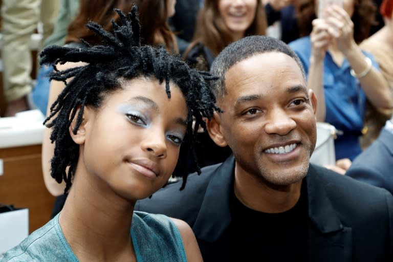 Will Smith (R) and his daughter Willow Smith pose before the Chanel 2016-2017 fall/winter Haute Couture collection fashion show in Paris