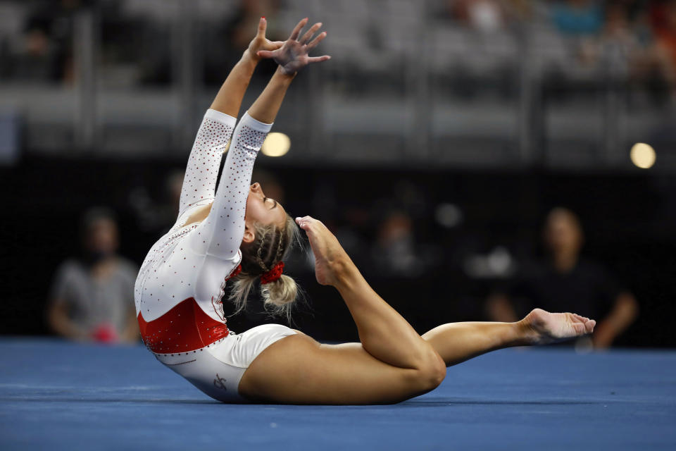 Utah's Sydney Soloski competes in the floor exercise during the NCAA college women's gymnastics championships, Saturday, April 16, 2022, in Fort Worth, Texas. (AP Photo/Gareth Patterson)