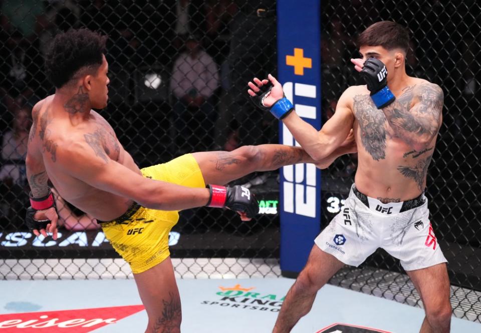 LAS VEGAS, NEVADA – MARCH 02: (L-R) Vinicius Oliveira of Brazil kicks Benardo Sopaj of Albania in a bantamweight bout during the UFC Fight Night event at UFC APEX on March 02, 2024 in Las Vegas, Nevada. (Photo by Jeff Bottari/Zuffa LLC via Getty Images)