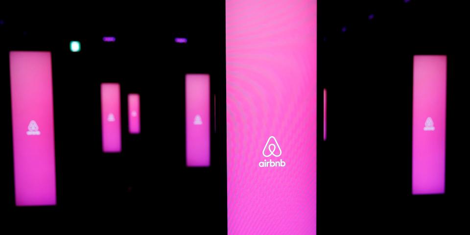 The logos of Airbnb are displayed at an Airbnb event in Tokyo, Japan, June 14, 2018.