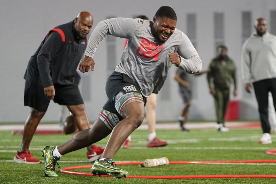 Ohio State defensive tackle Michael Hall Jr. runs a circle drill during the Buckeyes' pro day in March.