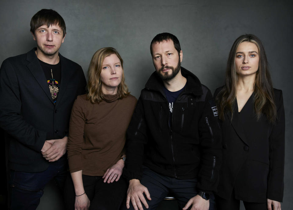 Photographer Evgeniy Maloletka, from left, "Frontline" producer/editor Michelle Mizner, director Mstyslav Chernov, and field producer Vasilisa Stepanenko pose for a portrait to promote the film "20 Days in Mariupol" at the Latinx House during the Sundance Film Festival on Sunday, Jan. 22, 2023, in Park City, Utah. (Photo by Taylor Jewell/Invision/AP)