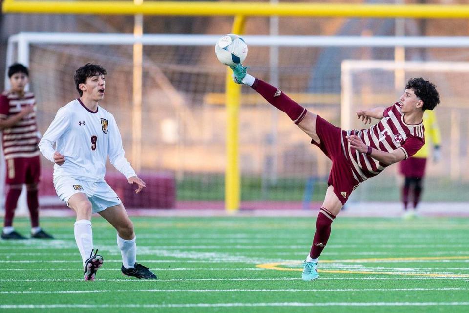 Golden Valley sophomore Daniel Gaona (5) kicks the ball during a NorCal Regional playoff game against Las Lomas at Golden Valley High School in Merced, Calif., on Tuesday, Feb. 27, 2024. The Knights beat the Cougars 3-1 in penalty kicks.