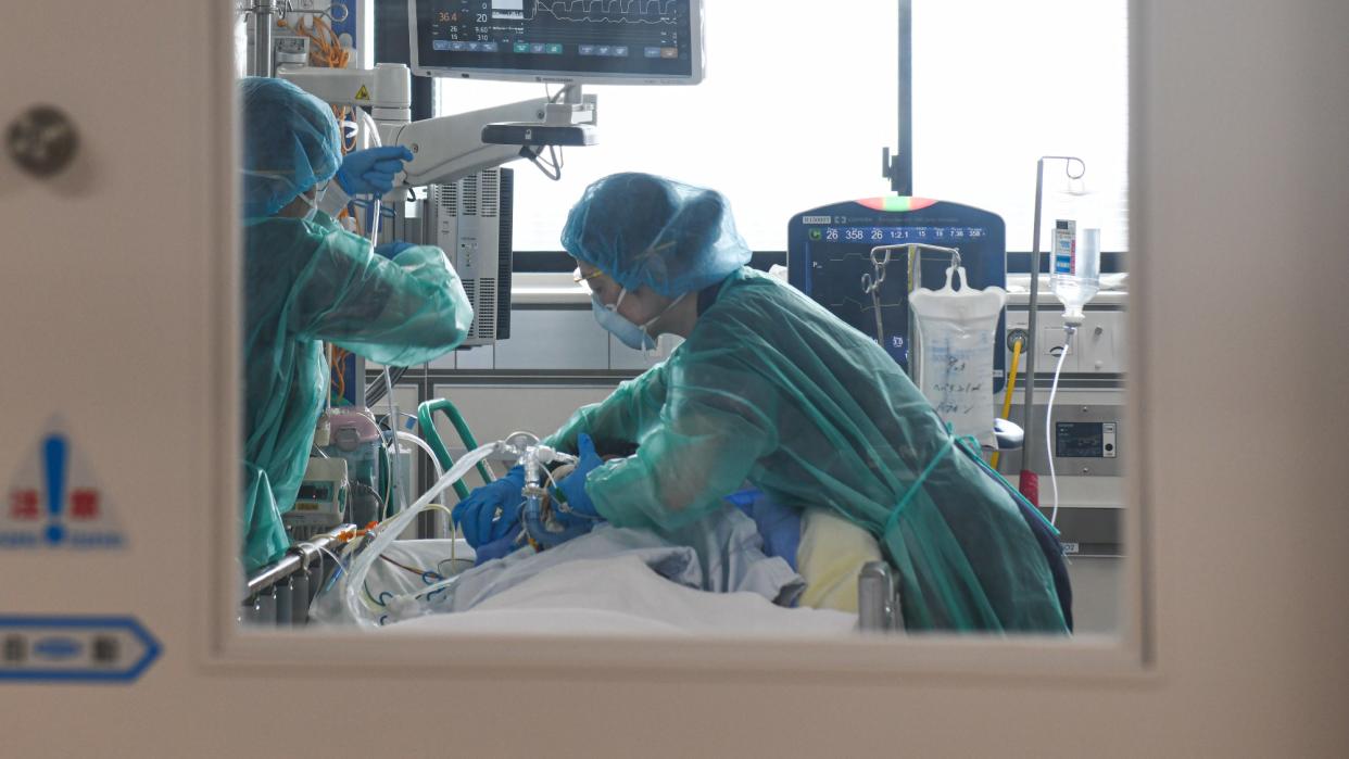  Medics treat a patient in the intensive care unit at Chiba University Hospital in Japan. 