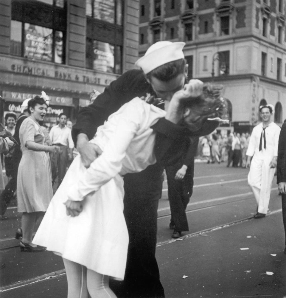 This photo of George Mendonsa kissing a woman in New York City in 1945 was taken by a U.S. Navy photographer at the same moment that photographer Alfred Eisenstaedt captured his famous photographic, which was published in Life magazine.&nbsp; (Photo: ASSOCIATED PRESS)