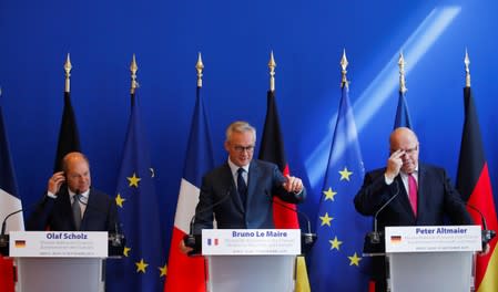 French Finance Minister Bruno Le Maire, German Economy Minister Peter Altmaier and German Finance Minister Olaf Scholz attend a joint news conference after a meeting in Paris