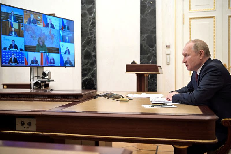 FILE PHOTO: Russian President Putin attends a meeting in Moscow