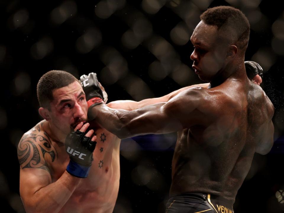 Israel Adesanya (right) again beat Robert Whittaker, this time on points (Getty Images)