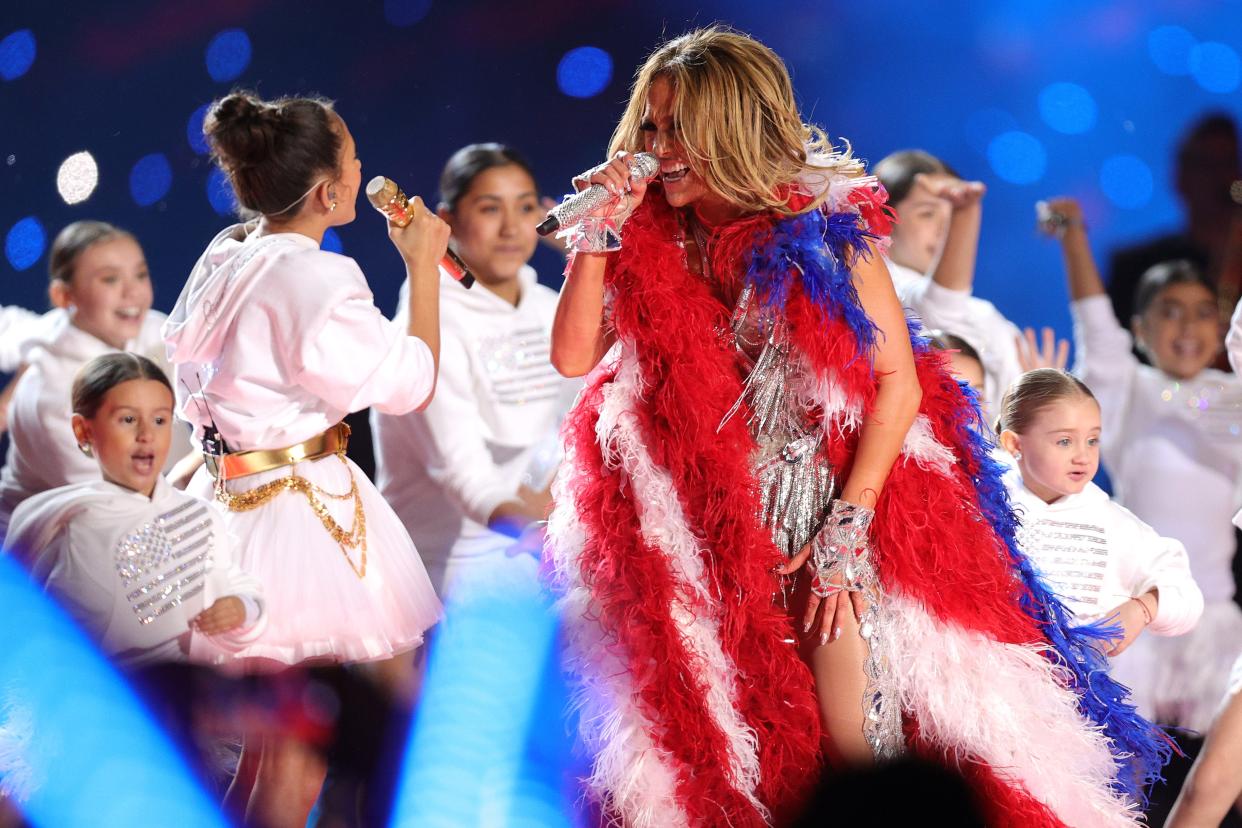 Jennifer Lopez performs along with her daughter Emme Maribel Mu–iz during the Super Bowl LIV Halftime Show.