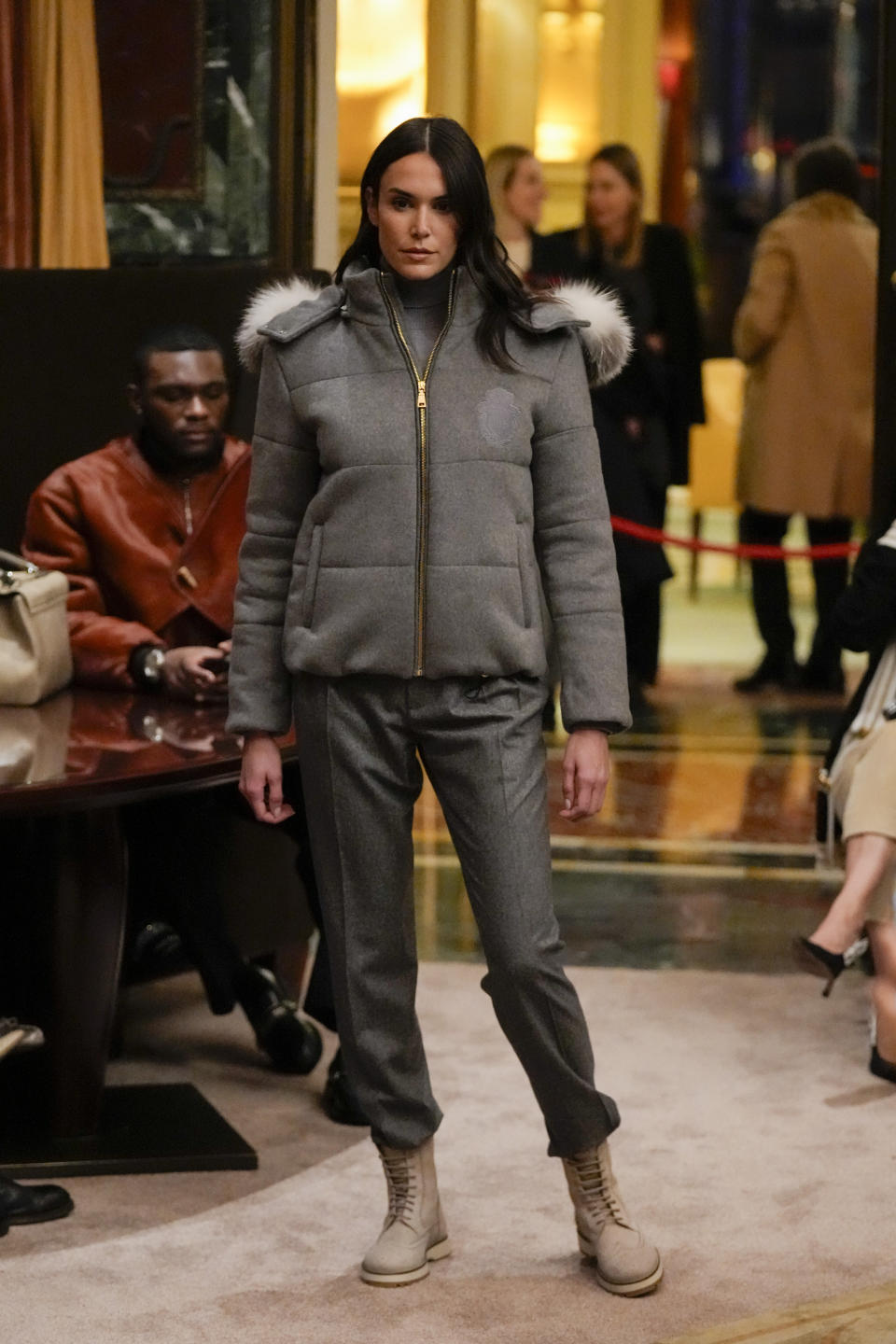 A model wears a creation as part of the men's Billionaire Fall-Winter 2024-2025 collection, that was presented in Milan, Italy, Friday, Jan. 12, 2024. (AP Photo/Antonio Calanni).