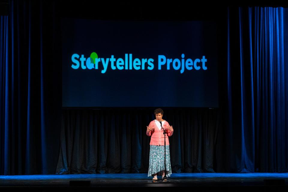 Susan Sims tells a story during the Des Moines Storytellers Project's "Travel" show at Hoyt Sherman Place on Tuesday, June 20, 2023, in Des Moines.