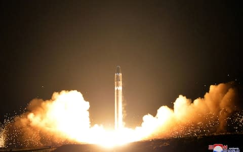 The Hwasong-15 intercontinental ballistic missile, - Credit: KCNA via KNS