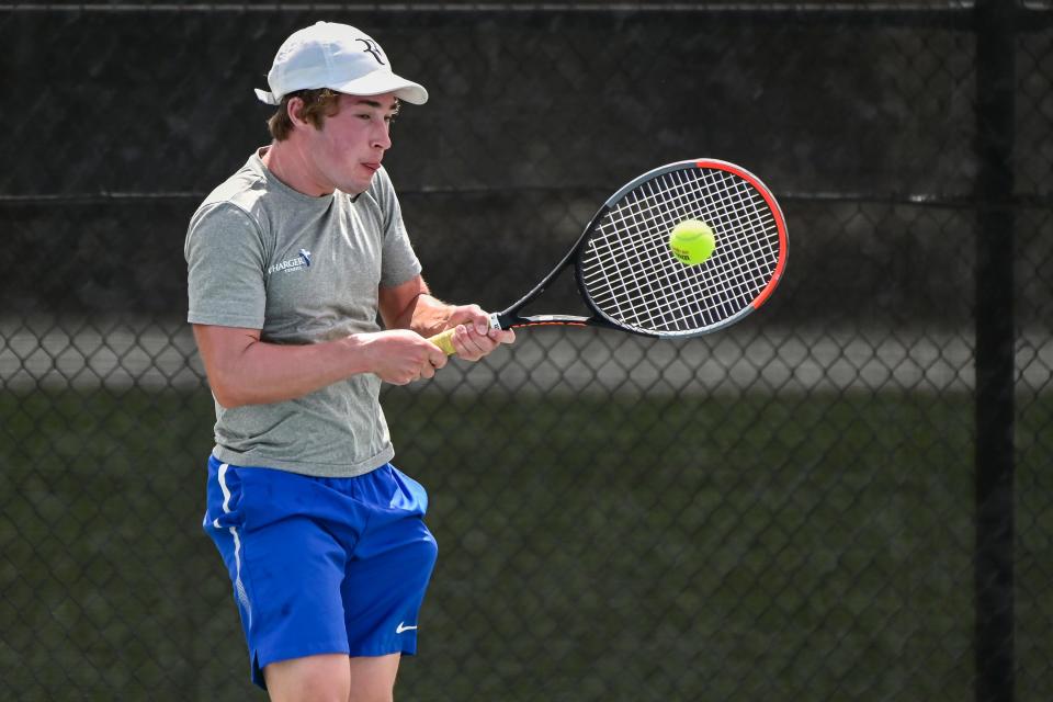 Sioux Falls Christian's Daniel Puumala returns a serve during the No. 2 singles championship against Mitchell's Tyler Loecker on day two of the Class A state tournament on Tuesday at Sioux Park.