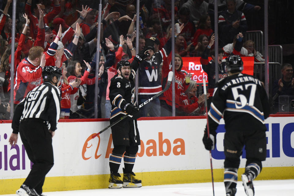 Washington Capitals left wing Alex Ovechkin (8) celebrates after his goal during the second period of an NHL hockey game against the Arizona Coyotes, Saturday, Nov. 5, 2022, in Washington. (AP Photo/Nick Wass)