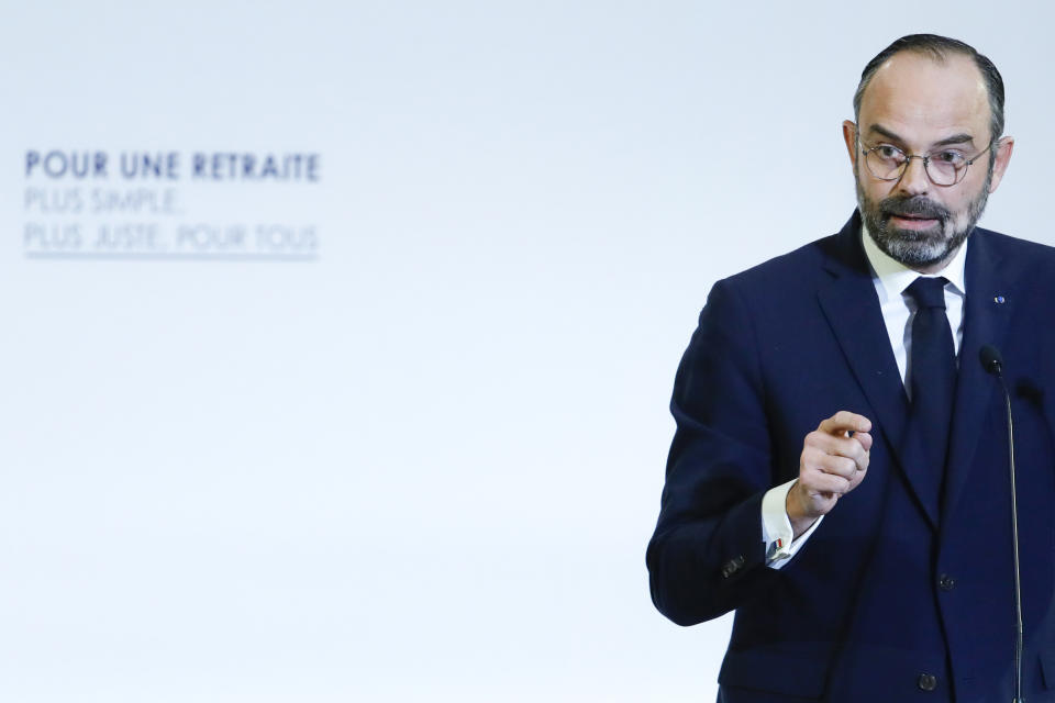 French Prime Minister Edouard Philippe delivers his speech Wednesday, Dec. 11, 2019 in Paris as he unveils proposals on pension reforms that might calm tensions on the seventh straight day of a crippling transport strike. (Thomas Samson/Pool via AP)