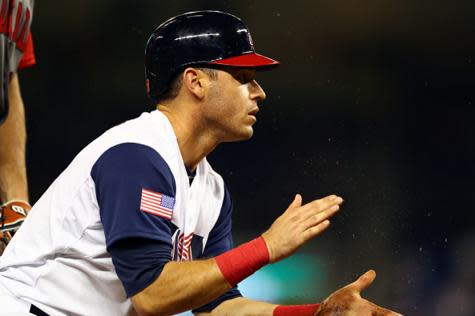 Ian Kinsler of Team USA claps during a recent victory at the World Baseball Classic. (Getty Images) 
