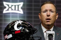 FILE - Cincinnati head football coach Scott Satterfield answers questions from reporters at the NCAA college football Big 12 media days in Arlington, Texas, Thursday, July 13, 2023. Big 12 newcomers BYU, Cincinnati, Houston and UCF all had losing records and debuted in the bottom half of the Big 12 standings last season. (AP Photo/Emil T. Lippe, File)
