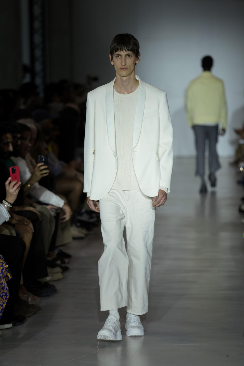 A model wears a creation as part of the Neil Barret men's Spring Summer 2024 collection presented in Milan, Italy, Saturday, June 17, 2023. (AP Photo/Antonio Calanni)