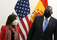 United States Defense Secretary Lloyd J. Austin III, right, poses with Spain's Defense Minister Maria Margarita Robles Fernandez prior to a bilateral meeting at NATO headquarters in Brussels, Thursday, Oct. 21, 2021. NATO defense ministers gather for their fall meeting to assess the fallout of Moscow's closure of its mission to the alliance and an overall worsening of relations with Moscow. (AP Photo/Virginia Mayo, Pool)