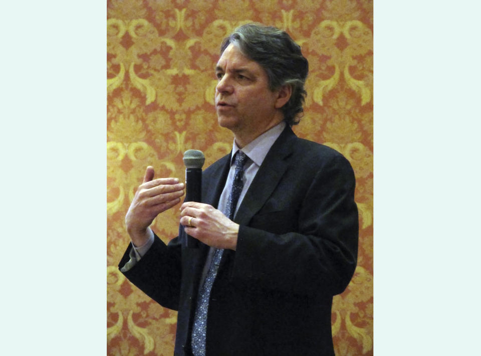 FILE - Joseph Goffman, associate assistant administrator for climate and senior counsel for the Environmental Protection Agency, addresses the Wyoming Infrastructure Authority winter meeting in Cheyenne, Wyo., on Feb. 3, 2015. The Senate approved Goffman, President Joe Biden's nominee, to lead the EPA's air pollution office on Wednesday, Jan. 31, 2024, just as the agency is set to finalize rules over climate-changing emissions from power plants and cars and trucks. (AP Photo/Mead Gruver, File)