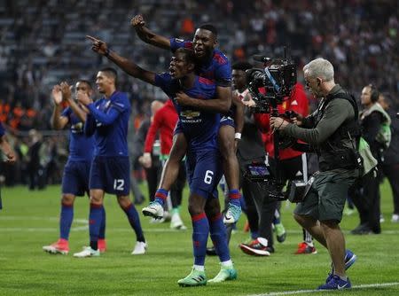 Football Soccer - Ajax Amsterdam v Manchester United - UEFA Europa League Final - Friends Arena, Solna, Stockholm, Sweden - 24/5/17 Manchester United's Timothy Fosu-Mensah and Paul Pogba celebrate winning the Europa League Reuters / Lee Smith Livepic