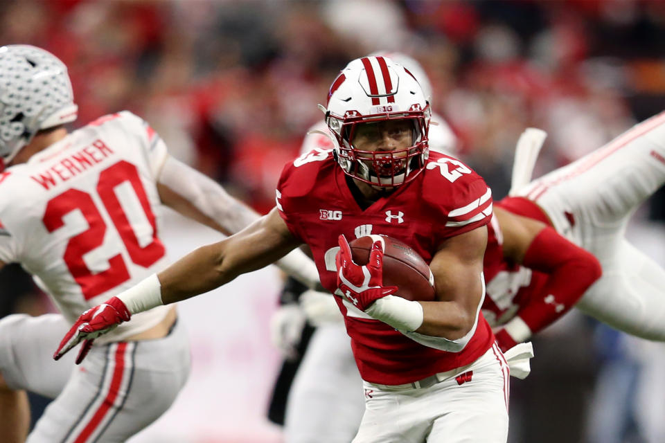 INDIANAPOLIS, INDIANA - DECEMBER 07: Jonathan Taylor #23 of the Wisconsin Badgers runs the ball in the Big Ten Championship game against the Ohio State Buckeyes at Lucas Oil Stadium on December 07, 2019 in Indianapolis, Indiana. (Photo by Justin Casterline/Getty Images)