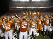 Texas Longhorns players gather during "The Eyes of Texas" after the game with the LSU Tigers Saturday Sept. 7, 2019 at Darrell K Royal-Texas Memorial Stadium in Austin, Tx. LSU won 45-38. ( Photo by Edward A. Ornelas )