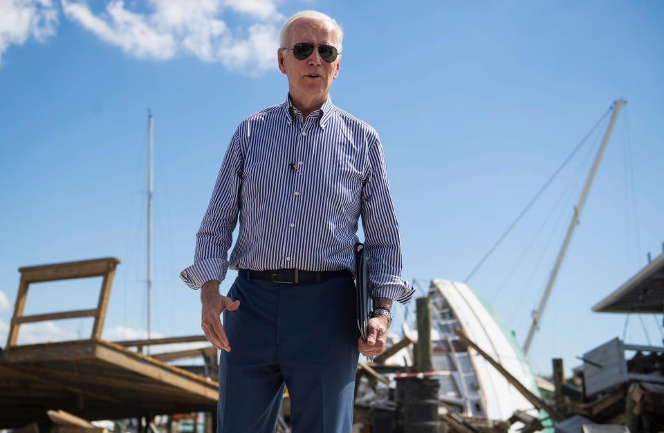 President Joe Biden visits Fisherman's Wharf in Fort Myers Beach, Fla., Wednesday, Oct. 5, 2022, to survey the damage caused by Hurricane Ian.