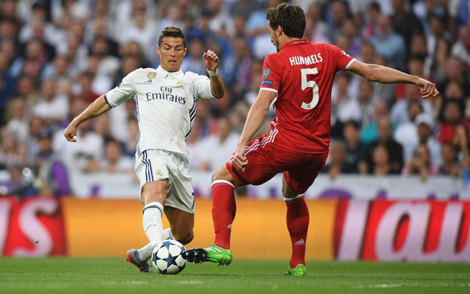 Cristiano Ronaldo of Real Madrid and Mats Hummels of Bayern Muenchen - Credit: GETTY