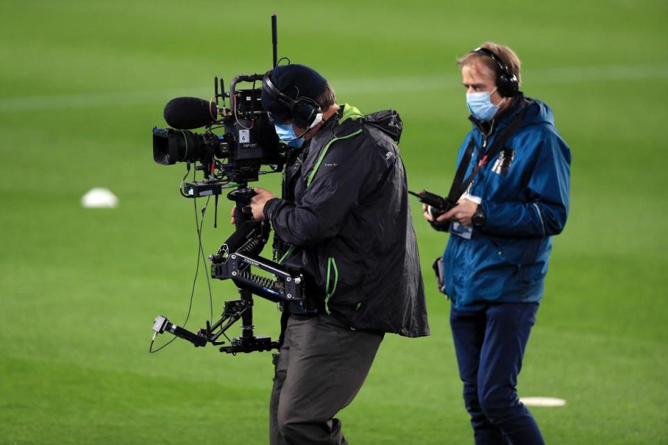 TV cameras on the pitch at a football match in the UK <i>(Image: PA)</i>