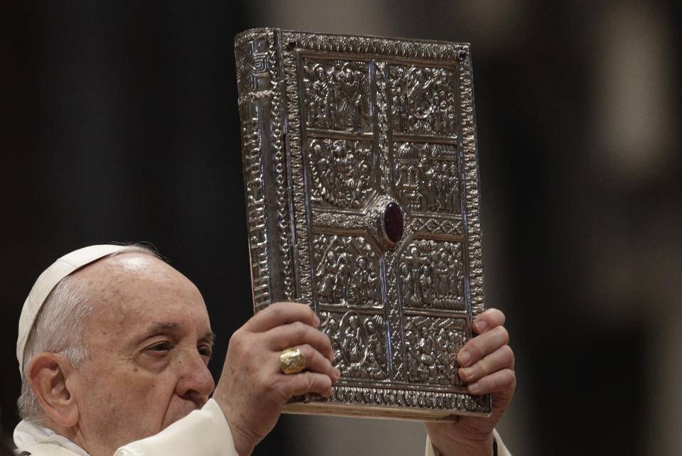 Pope Francis presides over a Mass for the solemnity of St. Mary at the beginning of the new year, in St. Peter's Basilica at the Vatican, Wednesday, Jan. 1, 2020. (AP Photo/Gregorio Borgia)