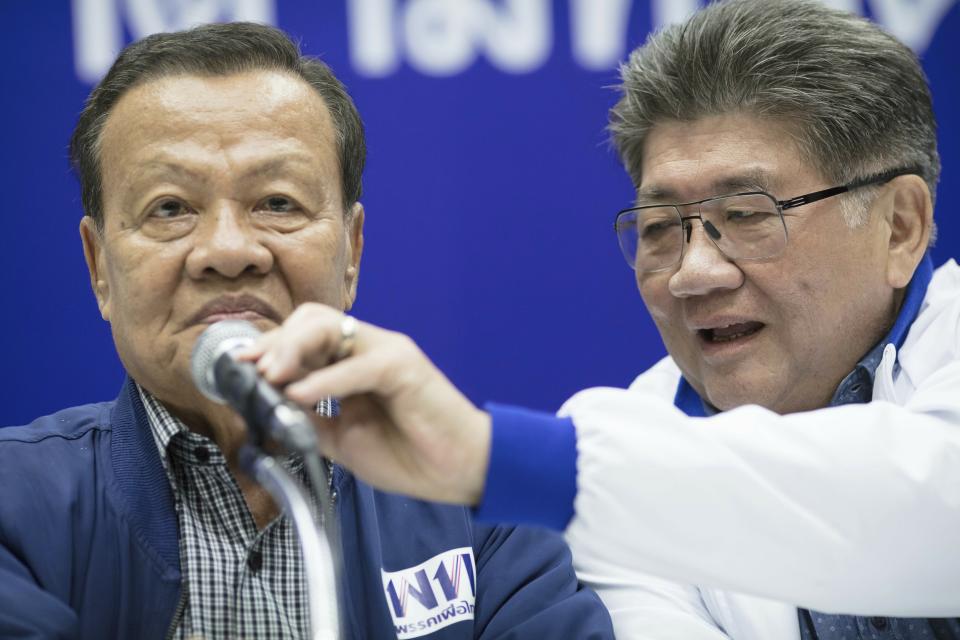 Senior leaders of Pheu Thai party, from left Virot Pao-In, leader and Phumtam Wechayachai, Secretary General hold a press conference at party head quarters in Bangkok, Thailand, Sunday, March 24, 2019. Figures from Thailand's Election Commission show a military-backed party has taken the lead in the country's first election since a 2014 coup. (AP Photo/Wason Wanichakorn)