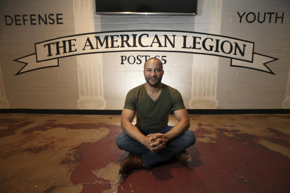 In this Tuesday, July 30, 2019 photo, activists Lawrence Robinson poses for a photograph at the Post 65 American Legion hall, formed during the era of segregation and recently renovated in Phoenix. Three American Legion posts stand within miles of each other in central Phoenix, a curious reminder of how segregation once ruled the U.S. Southwest as well as the Deep South. Decades later, tensions in Phoenix’s minority communities remain, spilling over this summer after video of police officers pointing guns and cursing at a black couple revived disturbing memories of the days of segregation, when black and Hispanic residents recall commonly being mistreated by police. (AP Photo/Ross D. Franklin)