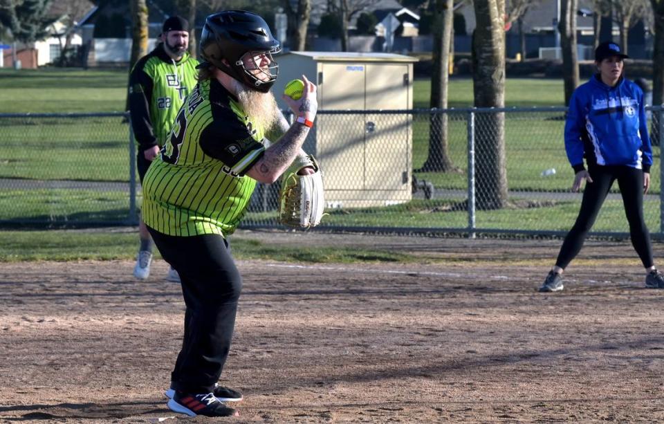 Breaking The Cycle pitcher Jacob Sloboda gets ready to throw against the Back To Basics team during the March 17 tournament hosted by the Olympic Division of the Clean and Sober Softball Association at Rainier Vista Community Park in Lacey. The organization’s focus is to support people who are in recovery from drug and alcohol addiction.