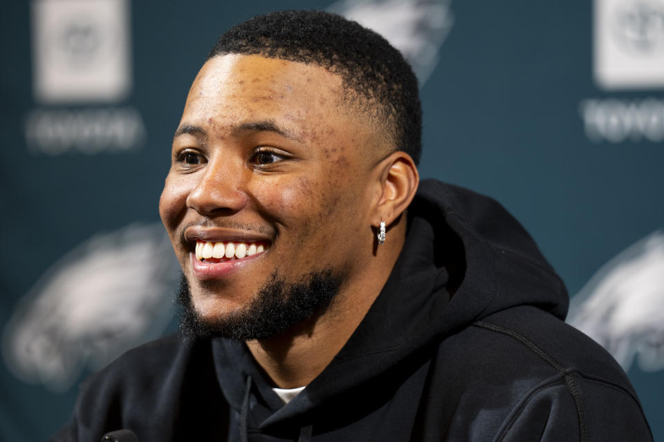 Philadelphia Eagles Saquon Barkley talks to the media during the press conference after signing with the Eagles, Thursday, March 14, 2024, in Philadelphia. (AP Photo/Chris Szagola)