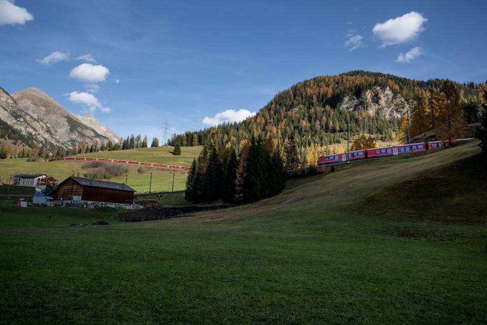 A  train with 100 cars passes by in Bergun, Switzerland, on October 29, 2022.