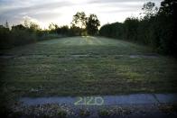 Abandoned land where a house used to stand is seen in the Lower Ninth Ward neighborhood of New Orleans, Louisiana, August 16, 2015. (REUTERS/Carlos Barria)