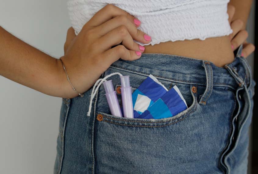 Picture of a Girl with sanitary pads and tampons in pocket Getty/Isabel Pavia