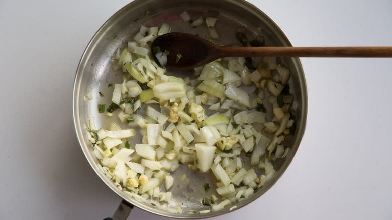 vegetables sauteing in skillet