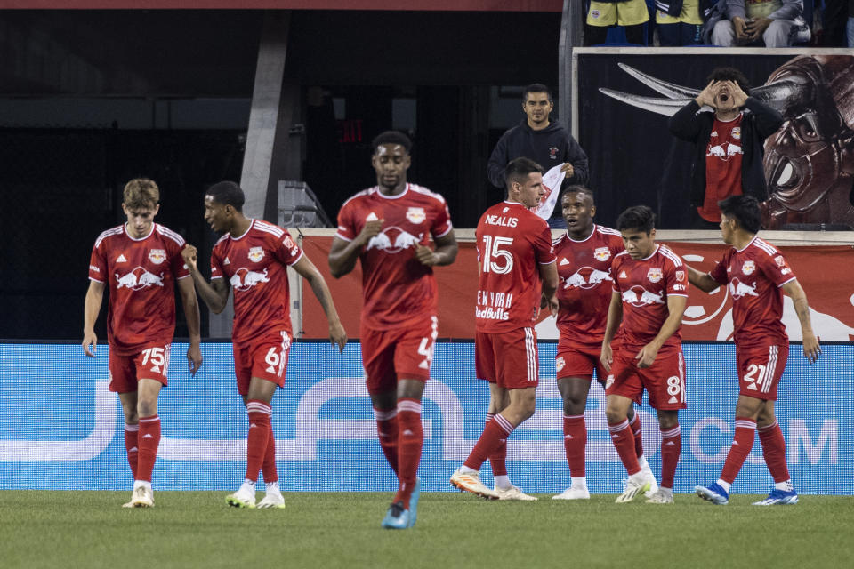 New York Red Bulls celebrate a goal against Charlotte FC during the first half of an MLS soccer match Wednesday, Oct. 25, 2023, in Harrison, N.J. (AP Photo/Eduardo Munoz Alvarez)