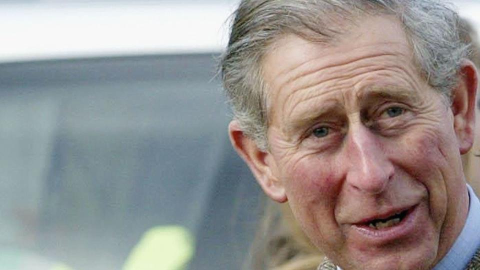 Charles wearing a signet ring