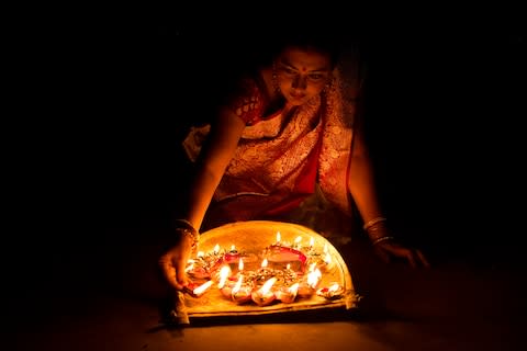 Celebrating Diwali in India - Credit: GETTY