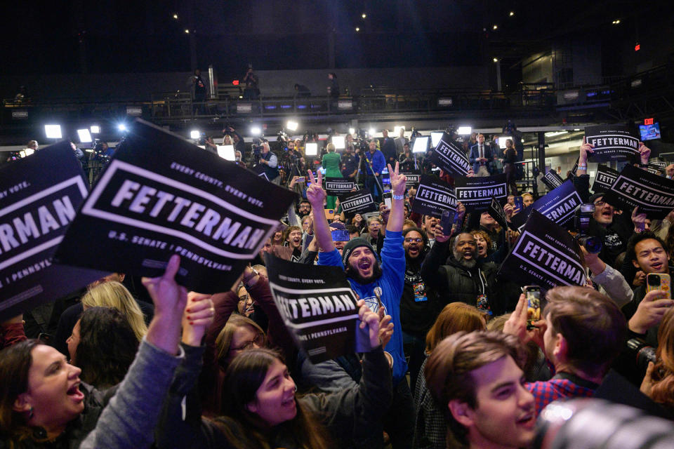 Supporters of John Fetterman react at a watch party during the midterm elections in Pittsburgh, on Nov. 8, 2022.<span class="copyright">Angela Weiss—AFP/Getty Images</span>